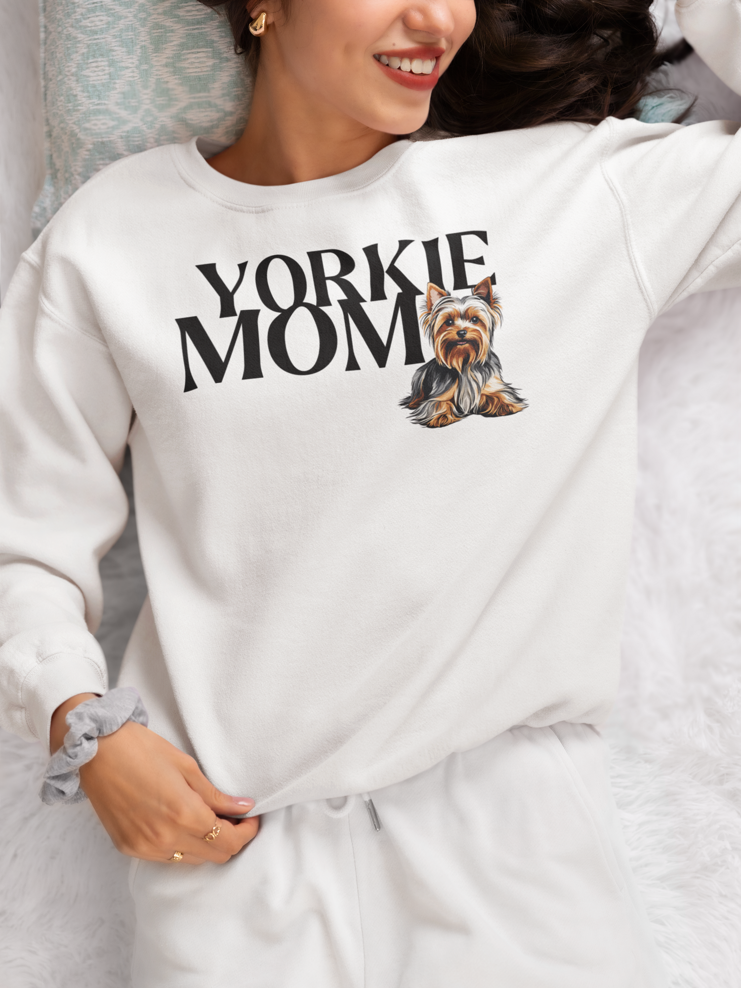 White sweatshirt with yorkshire terrier design featuring black text Yorkie mom.