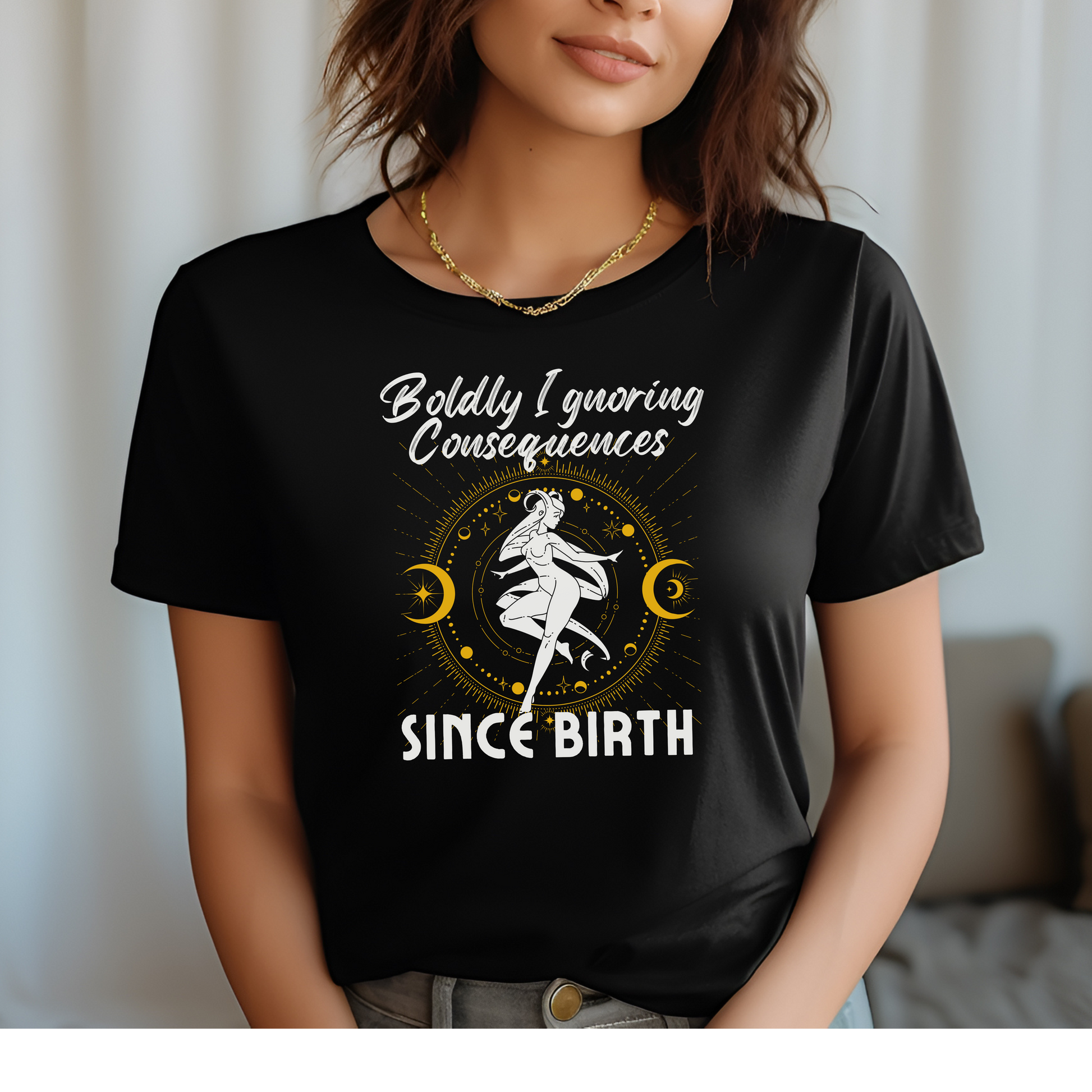 Black t-shirt with 'Boldly Ignoring Consequences Since Birth' text and celestial illustration.