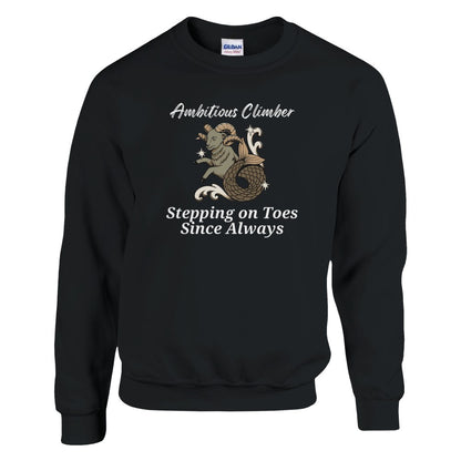 Front of black Capricorn-themed sweatshirt with a playful design featuring a Capricorn goat character and the text 'Ambitious Climber - Stepping on Toes Since Always.