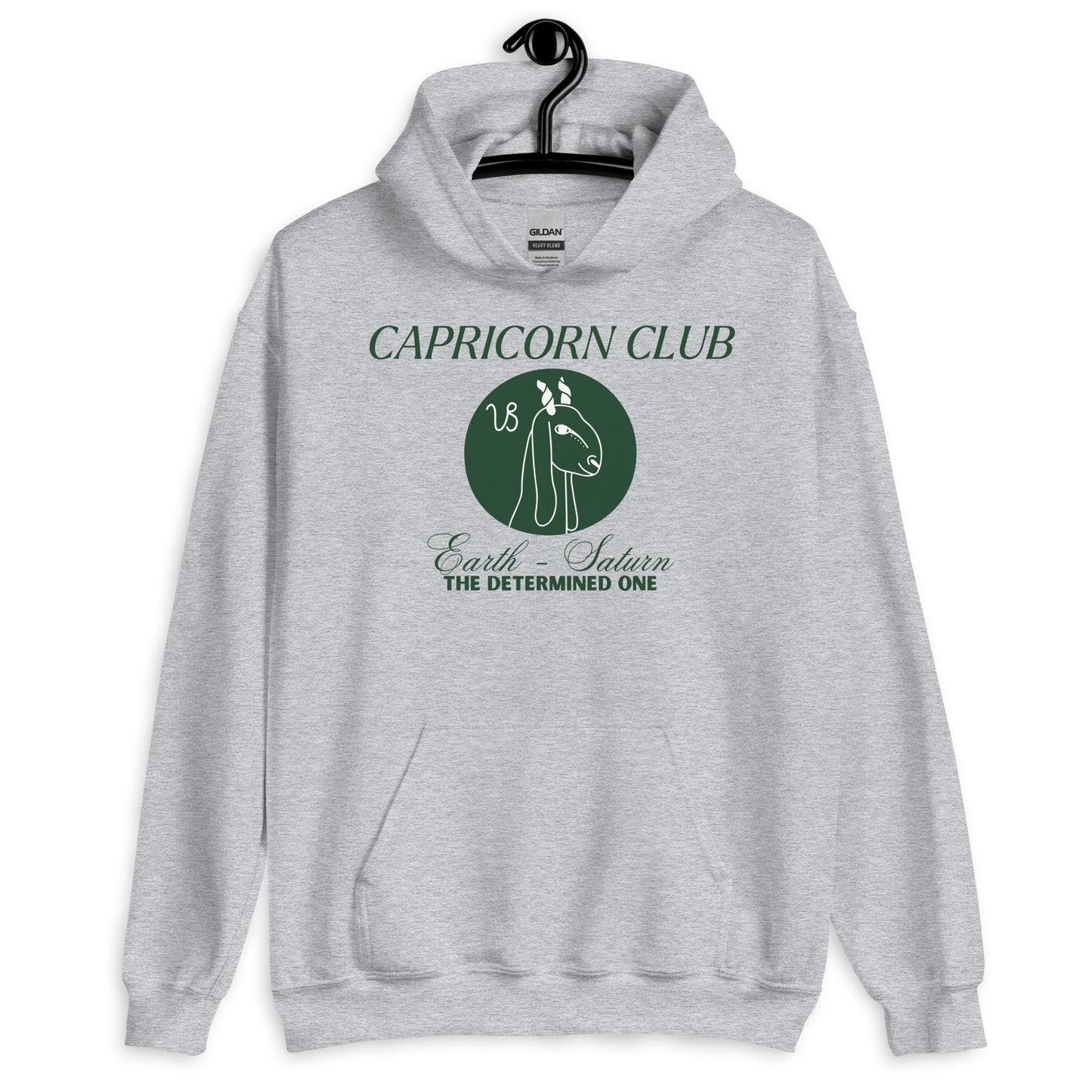 Front of sport grey Capricorn-themed hoodie with green 'Capricorn Club' text, Capricorn symbol illustration, and phrase 'Earth - Saturn, The Determined One.