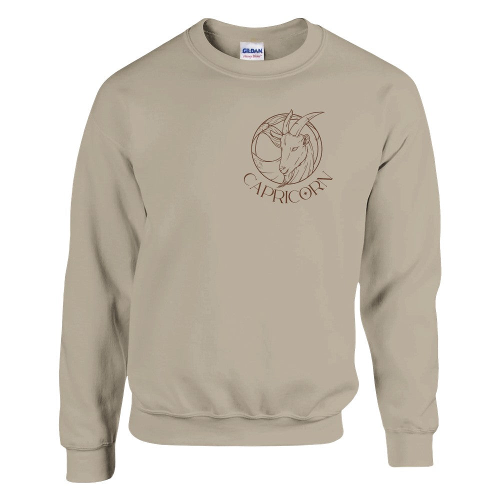 Front of sand Capricorn-themed sweatshirt with minimal astrology design featuring Capricorn symbol in brown.