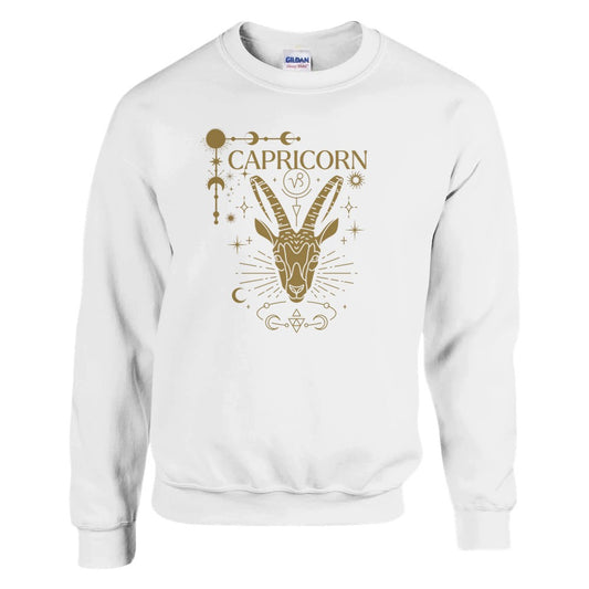 Front of white Capricorn-themed sweatshirt featuring a glamorous brownish-gold illustration of a goat symbol with celestial and ornate details.