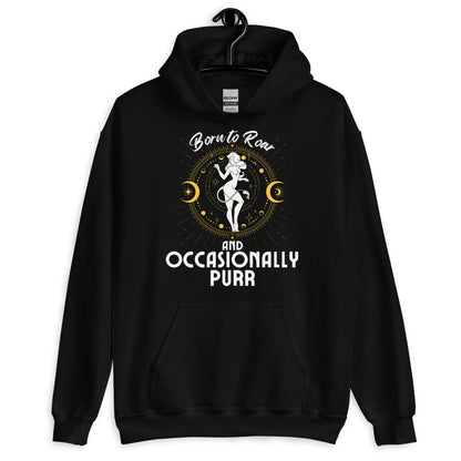 Front of black hoodie with Leo-themed design, featuring an illustration of a character surrounded by celestial elements and text that reads 'Born to Roar and Occasionally Purr.