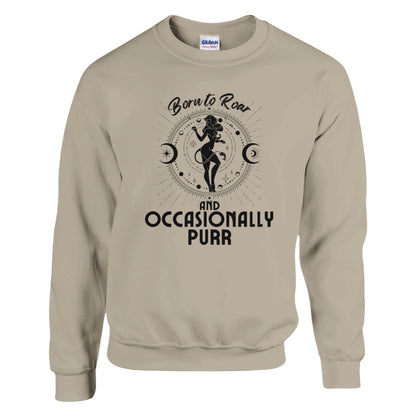 Front of sand sweatshirt featuring a Leo-themed design with a celestial motif around a lion figure in black. Text reads 'Born to Roar and Occasionally Purr.