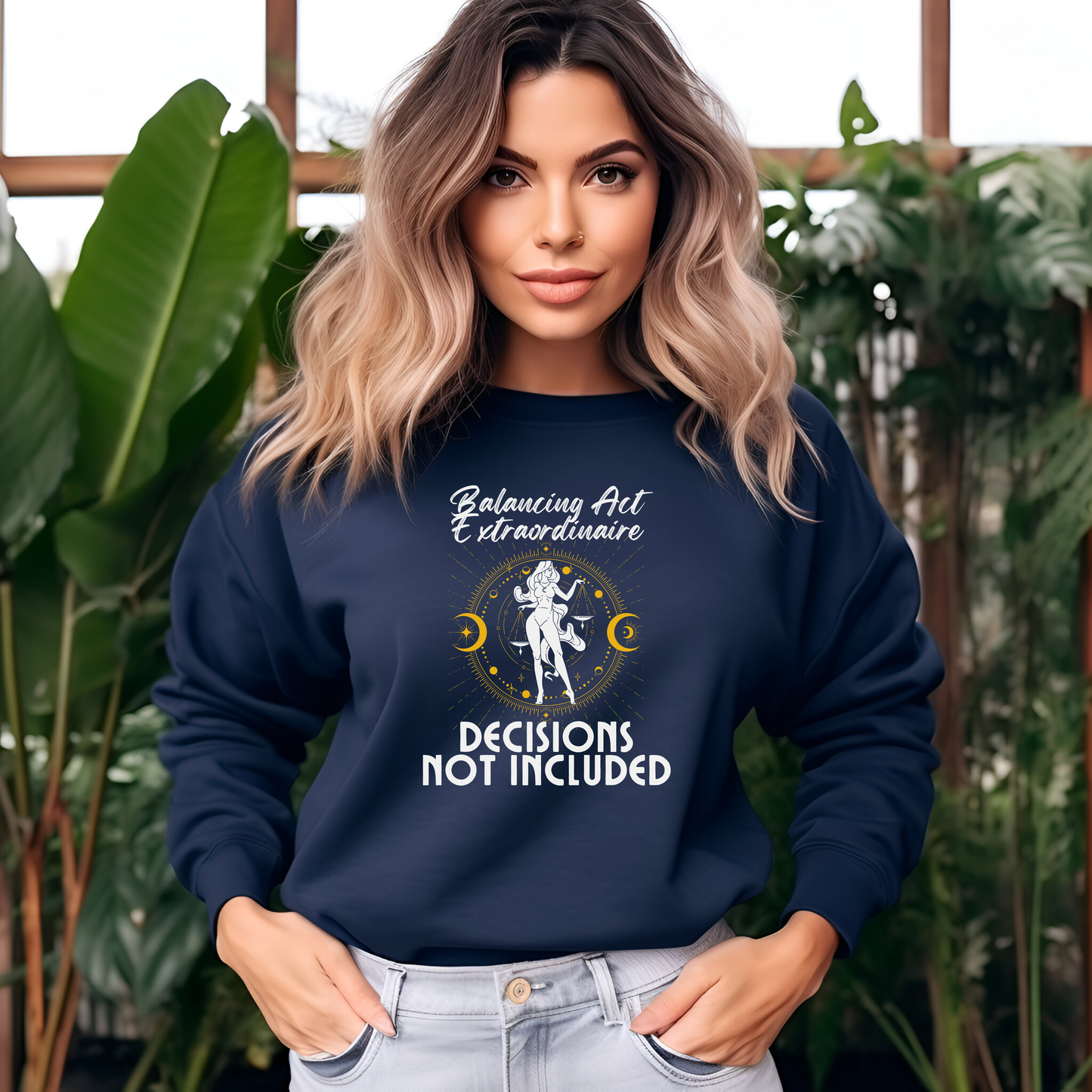 Front of navy blue Libra sweatshirt with 'Balancing Act Extraordinaire - Decisions Not Included' and artistic scales illustration.