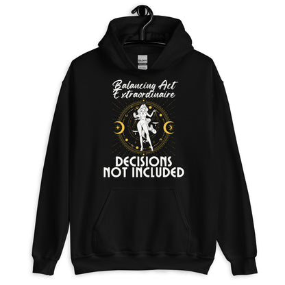 Front of black Libra hoodie with 'Balancing Act Extraordinaire' and 'Decisions Not Included' design featuring scales and celestial symbols.