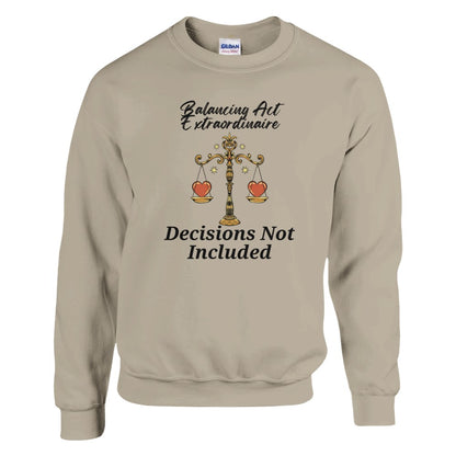 Front of sand Libra sweatshirt featuring a balancing scale with hearts, phrase 'Balancing Act Extraordinaire - Decisions Not Included'.