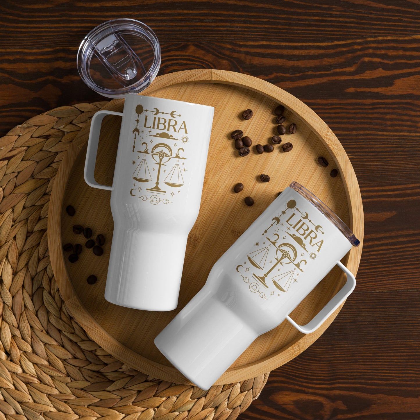 White Libra travel mug with handle, featuring scales illustration and 'Libra' text in elegant brown design.