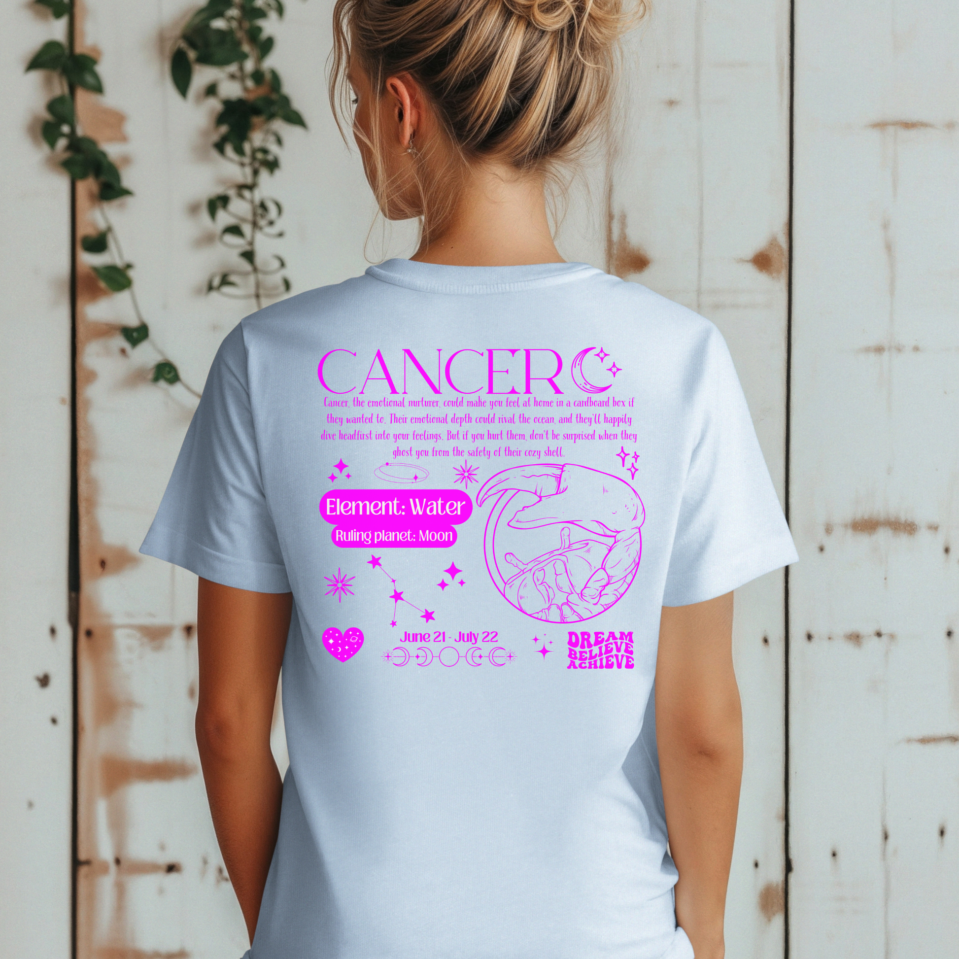 Back of light blue Cancer-themed t-shirt featuring pink retro zodiac design with traits, Cancer symbol, element Water, and ruling planet Moon.