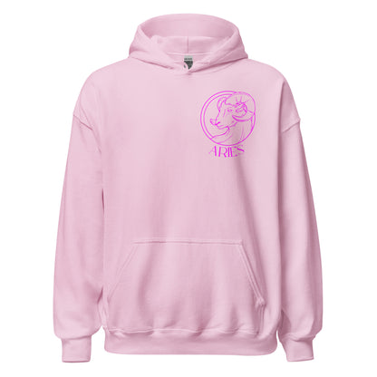 Front of light pink Aries hoodie with dark pink zodiac ram symbol and Aries text design.