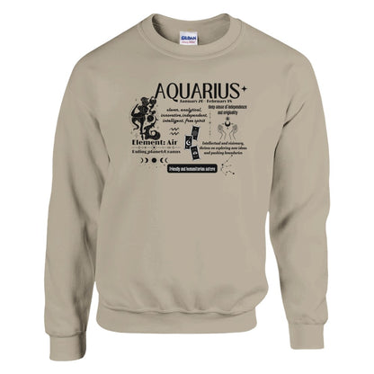 Sand sweatshirt featuring a retro Aquarius design. Includes the word 'Aquarius' along with the birth dates, core traits like 'clever,' 'independent,' and 'humanitarian,' and symbols for the Air element and ruling planet Uranus. The design is complemented by celestial illustrations, highlighting Aquarius's innovative and visionary spirit.