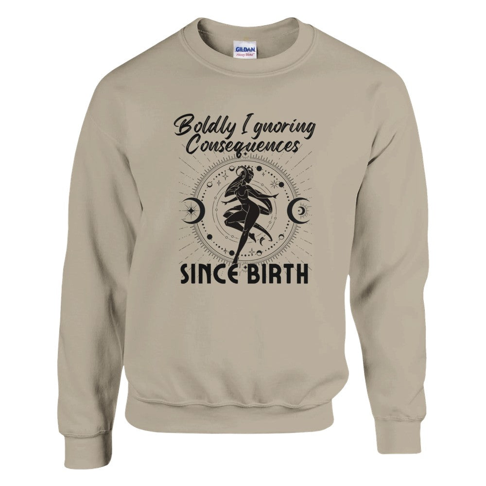 Sand sweatshirt with 'Boldly Ignoring Consequences Since Birth' text and black celestial illustration.