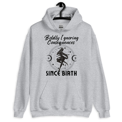 Sport grey hoodie with 'Boldly Ignoring Consequences Since Birth' text and celestial illustration.