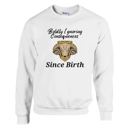 White sweatshirt with 'Boldly Ignoring Consequences Since Birth' text and Aries ram illustration.